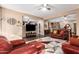 Open living room with hardwood floors and a view into the kitchen at 4081 E Dublin St, Gilbert, AZ 85295