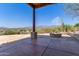 Fire pit on a patio with mountain views at 45425 N 14Th St, New River, AZ 85087