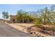 One-story house with desert landscaping at 45425 N 14Th St, New River, AZ 85087