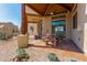 Covered patio with a table and chairs, offering scenic views at 45425 N 14Th St, New River, AZ 85087