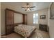 Bedroom with built-in wall unit and window seat at 5196 W Tortoise Dr, Eloy, AZ 85131