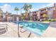 Community swimming pool with a spacious deck at 5401 E Van Buren St # 1006, Phoenix, AZ 85008