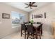 Eat-in kitchen with a table and six chairs at 653 N Overland St, Mesa, AZ 85207