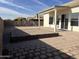 Backyard with patio, playground, and raised garden bed at 6891 W Via Del Sol Dr, Glendale, AZ 85310