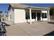 Spacious backyard with patio, covered porch and playground at 6891 W Via Del Sol Dr, Glendale, AZ 85310