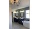 Spa-like bathroom with double vanity, soaking tub, and herringbone tile at 6891 W Via Del Sol Dr, Glendale, AZ 85310
