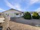 Ranch style home with a well-maintained front yard and a two-car garage at 724 N 66Th Pl, Mesa, AZ 85205