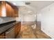 Open kitchen with granite countertops and modern cabinetry at 724 N 66Th Pl, Mesa, AZ 85205