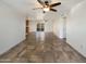 Spacious living area with tile floors and access to the patio at 724 N 66Th Pl, Mesa, AZ 85205