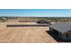 Aerial view of two new homes on a large lot at 8540 W Ginger Trl, Casa Grande, AZ 85194