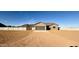 New construction home with a two-car garage and block wall at 8540 W Ginger Trl, Casa Grande, AZ 85194