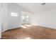 Spacious bedroom with large windows and brown carpet at 10350 W Foothill Dr, Peoria, AZ 85383