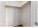 Well-lit closet with wood shelving and a hanging rod at 10350 W Foothill Dr, Peoria, AZ 85383