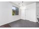 Bright dining area with modern light fixture and gray tile flooring at 10350 W Foothill Dr, Peoria, AZ 85383