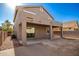 Two story house with covered patio and desert landscaping at 10350 W Foothill Dr, Peoria, AZ 85383