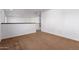 Spacious loft area with brown carpet and neutral walls at 10350 W Foothill Dr, Peoria, AZ 85383