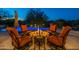 Relaxing fire pit surrounded by comfortable seating at 10742 E Greythorn Dr, Scottsdale, AZ 85262