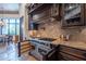 Modern kitchen with stainless steel appliances and custom cabinetry at 10742 E Greythorn Dr, Scottsdale, AZ 85262