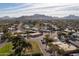 Aerial view of house and surrounding neighborhood with mountain views at 10801 N 45Th St, Phoenix, AZ 85028