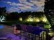 Evening view of backyard with seating area and pool at 10801 N 45Th St, Phoenix, AZ 85028
