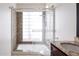 Clean bathroom with shower/tub combo and updated fixtures at 10801 N 45Th St, Phoenix, AZ 85028