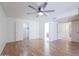 Bright and airy bedroom with wood floors and access to bathroom at 10801 N 45Th St, Phoenix, AZ 85028