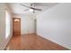 Bright bedroom with hardwood floors and ceiling fan at 10801 N 45Th St, Phoenix, AZ 85028