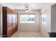Bright breakfast nook with backyard view and built-in cabinetry at 10801 N 45Th St, Phoenix, AZ 85028