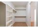 Large walk-in closet with shelving for convenient storage at 10801 N 45Th St, Phoenix, AZ 85028
