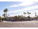 Tan colored house with arched entryway and attached garage at 10801 N 45Th St, Phoenix, AZ 85028