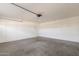 Spacious garage with concrete floor and ample storage at 10801 N 45Th St, Phoenix, AZ 85028