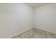 Bright laundry room with tile floor and white cabinets at 10801 N 45Th St, Phoenix, AZ 85028