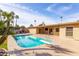 Inviting pool area with diving board and expansive backyard at 10801 N 45Th St, Phoenix, AZ 85028