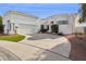 White two-story home with a three-car garage at 11549 E Bella Vista Dr, Scottsdale, AZ 85259