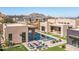 Modern home with a large pool and expansive backyard at 12659 E Shadow Ridge Dr, Scottsdale, AZ 85255