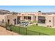 Luxury home with a spacious backyard, pool, and fire pit at 12659 E Shadow Ridge Dr, Scottsdale, AZ 85255