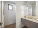 Contemporary powder room with floating vanity and sleek hardware at 12659 E Shadow Ridge Dr, Scottsdale, AZ 85255