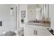 Modern bathroom with a walk-in shower and white cabinets at 12659 E Shadow Ridge Dr, Scottsdale, AZ 85255