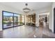 Bright interior with hardwood floors, large windows, and built-in shelving at 12659 E Shadow Ridge Dr, Scottsdale, AZ 85255