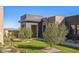 Private courtyard with drought-tolerant landscaping and artificial turf at 12659 E Shadow Ridge Dr, Scottsdale, AZ 85255