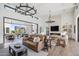 Spacious living room with high ceilings, fireplace, and large windows at 12659 E Shadow Ridge Dr, Scottsdale, AZ 85255