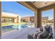 Covered patio overlooking the pool and backyard at 12659 E Shadow Ridge Dr, Scottsdale, AZ 85255