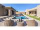 Inviting pool with spacious deck and comfortable lounge chairs at 12659 E Shadow Ridge Dr, Scottsdale, AZ 85255