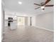 Open concept living room with kitchen and tile flooring at 13837 N 38Th St, Phoenix, AZ 85032