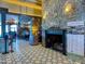 Restaurant lobby with a fireplace and seating area for guests at 24615 S Golfview Dr, Sun Lakes, AZ 85248