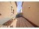 Small paved backyard with seating area at 2535 N 73Rd Dr, Phoenix, AZ 85035