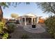 Landscaped backyard with patio, hot tub and fire pit at 26053 W Tonopah Dr, Buckeye, AZ 85396