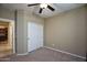 Bedroom with closet and view of kitchen at 26053 W Tonopah Dr, Buckeye, AZ 85396