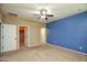 Spacious bedroom with neutral walls, carpeting, and a large closet at 26053 W Tonopah Dr, Buckeye, AZ 85396