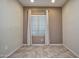 Bright dining area with large window and tile flooring at 26053 W Tonopah Dr, Buckeye, AZ 85396